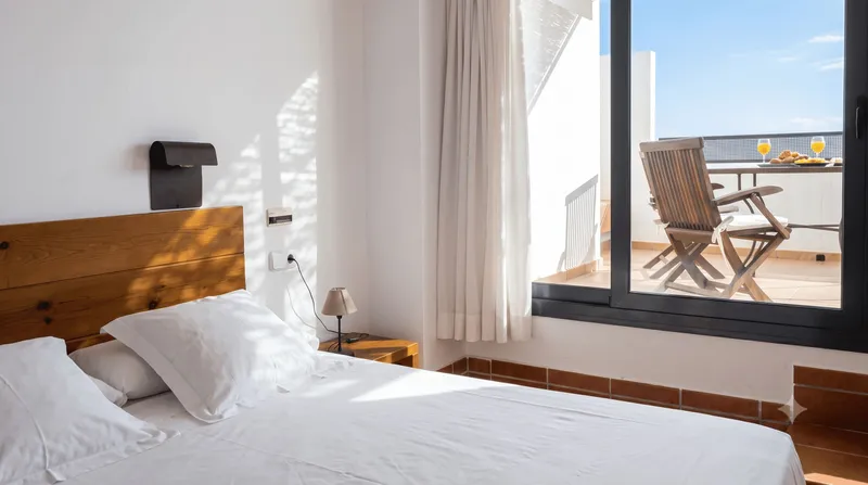 Doble Vistas al Mar - cama y vistas